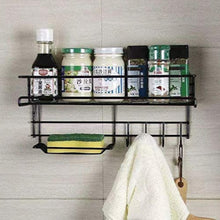 Adjustable shower rack for holding various household items.