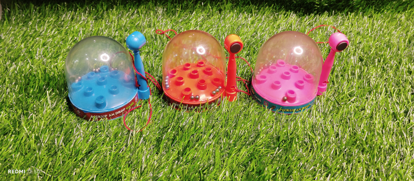 Magnetic Pick-Up and Drop Dome Game
